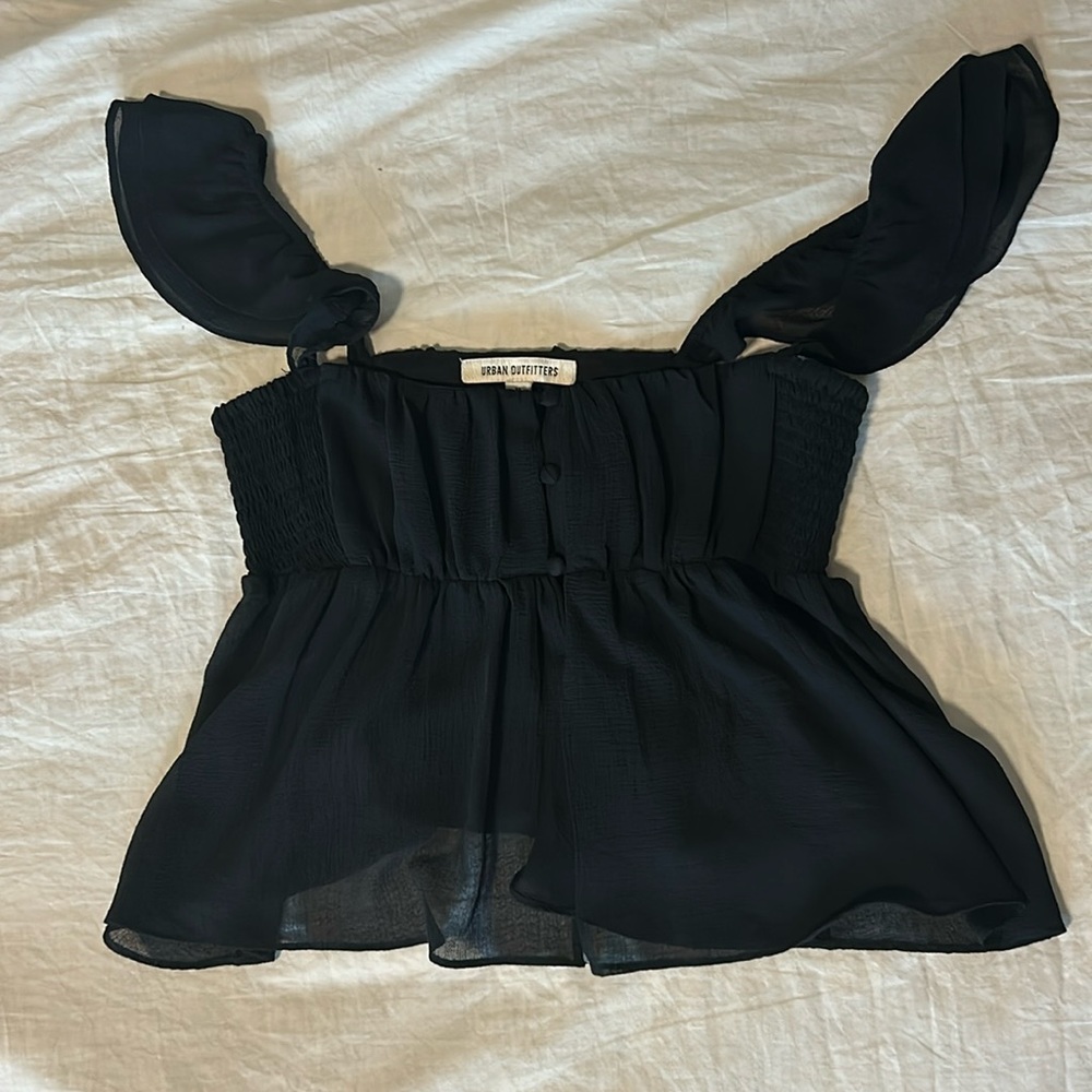Urban Outfitters flowy black top. Size medium. Colored Black.
